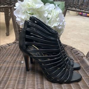 Jessica Simpson peep toe four inch heel sandal.